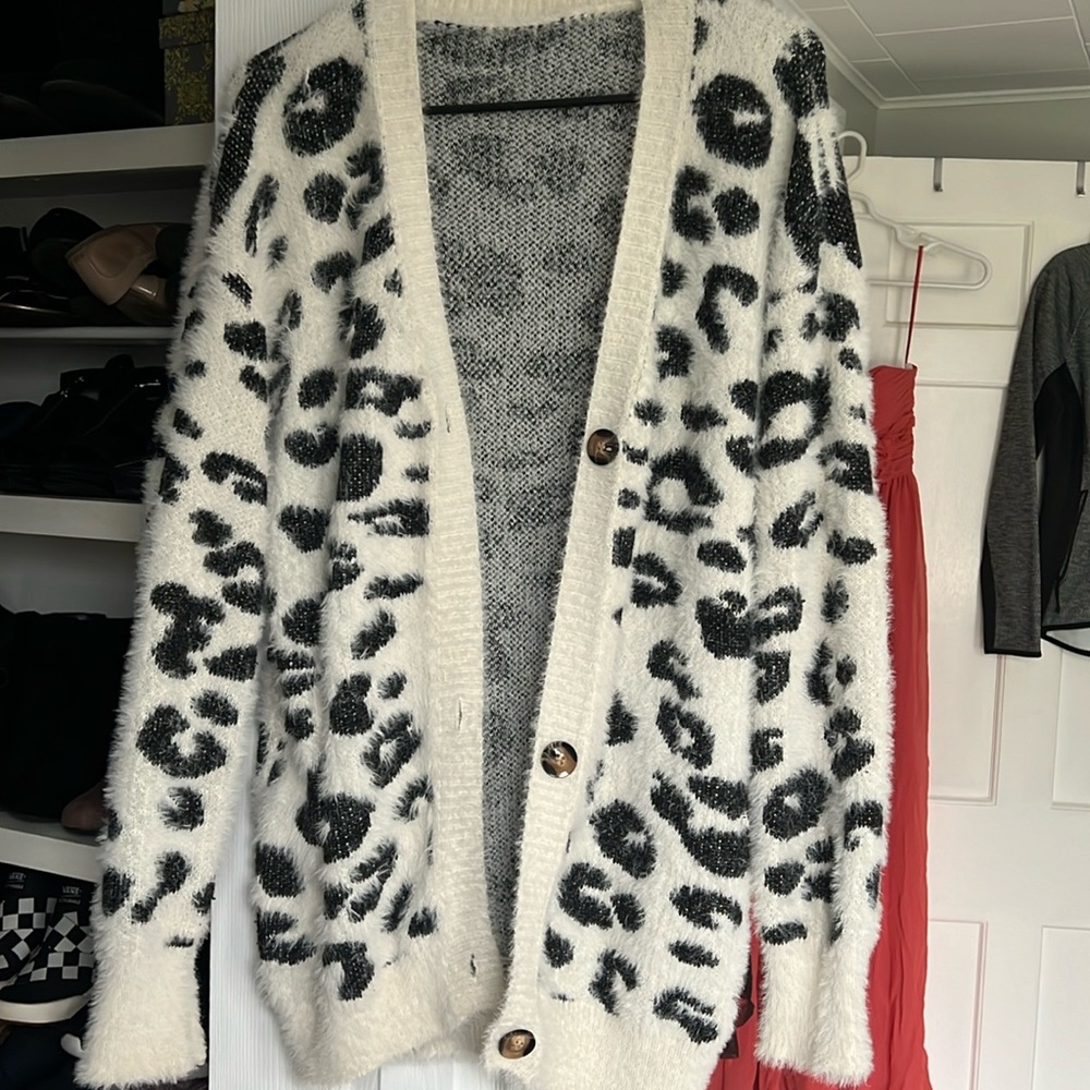 Cozy sweater. Open. Size medium.